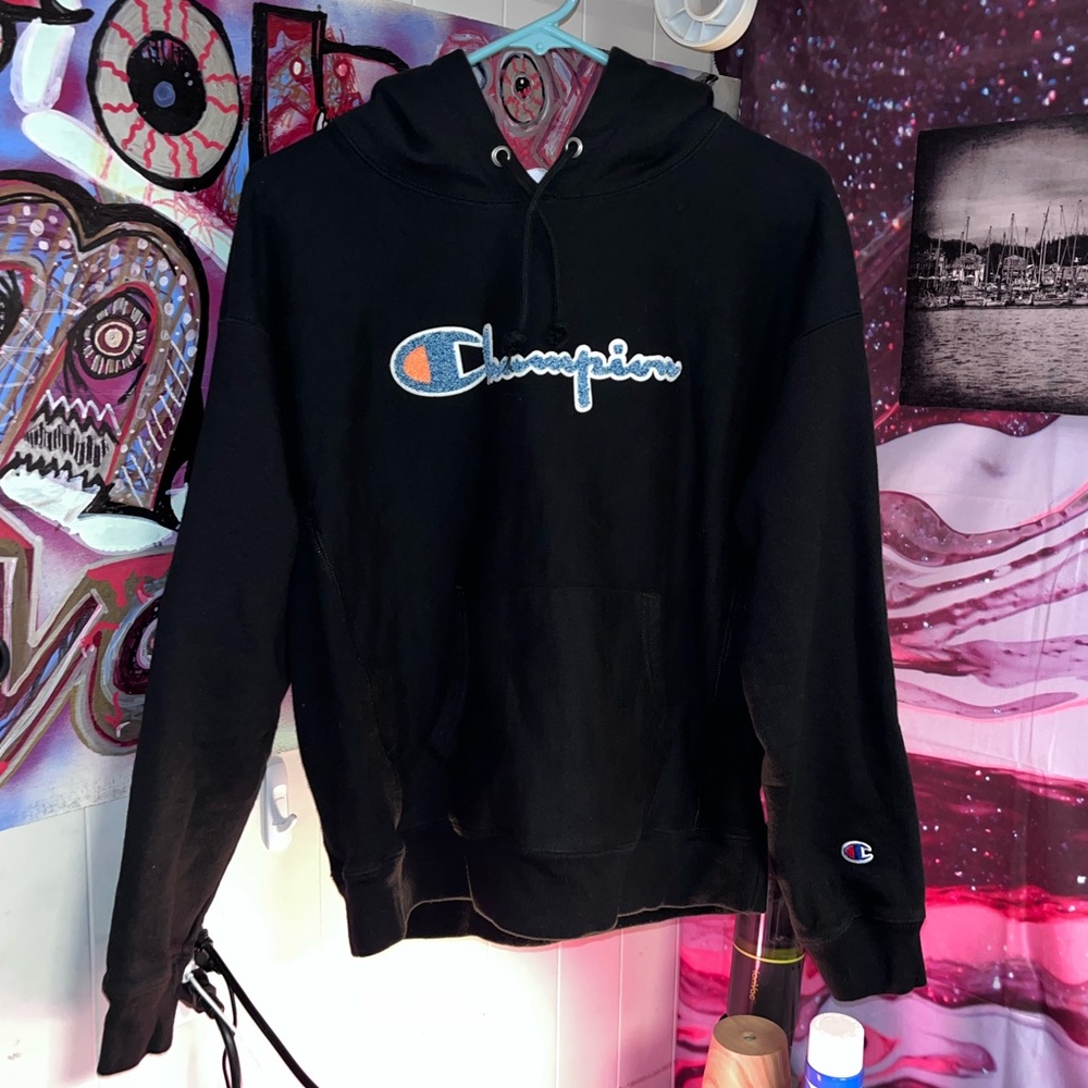 Woman’s Large Reverse Weave Black with fuzzy lettering. Excellent condition!